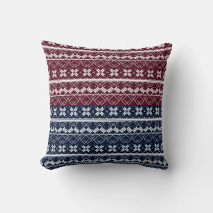 Scandinavian ornament on a blue, burgundy cushion