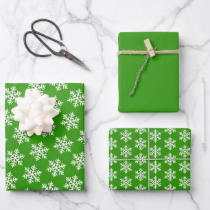 Scandinavian White Snowflake Pattern on Green Wrapping Paper Sheet