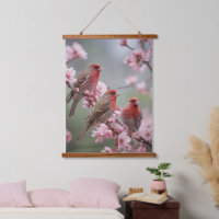 "Scarlet Trio: Red Finches Among Pink Blossoms"