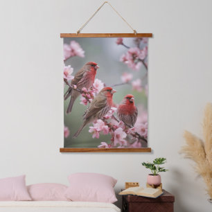 "Scarlet Trio: Red Finches Among Pink Blossoms" Hanging Tapestry