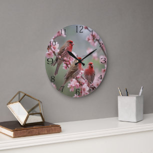 "Scarlet Trio: Red Finches Among Pink Blossoms" Large Clock