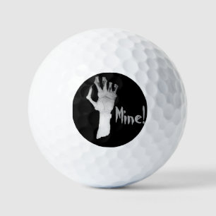 Scary gruesome gnarled monsters hand golf balls