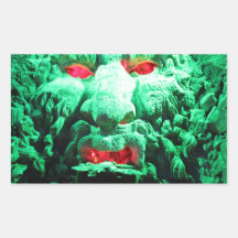 Scary Masked Face in Rock Face