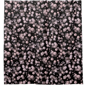 Scatterings of pink and white pearls on black velv shower curtain