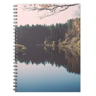 Scenic autumn coloured river in country with trees notebook