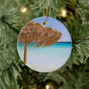 Scenic Tropical Beach with Straw Umbrella Ceramic Ornament