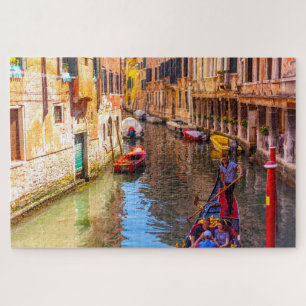 Scenic view of a canal with gondola, Venice, Italy Jigsaw Puzzle