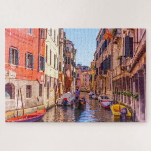 Scenic view of a canal with gondola, Venice, Italy Jigsaw Puzzle