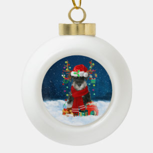 Schnauzer dog with Christmas gifts Ceramic Ball Christmas Ornament