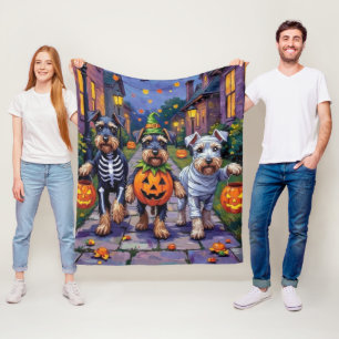 Schnauzer Trick-or-Treating in Halloween Costumes Fleece Blanket