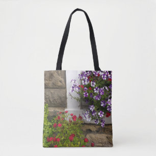 Scottish cottage window with petunias and roses tote bag