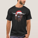 Scottish Highland Cow Christmas Santa Hat T-Shirt<br><div class="desc">Here's Wee Hamish the furriest, happiest, and smiliest 'hielan coo' from Scotland, feeling festive and wearing his bonnie xmas Santa hat to keep him cosy - brrr, well it does get cold in the highlands! This wee heilan coo will melt the heart of any longhorn cattle lovers, Scottish ex-pats, or...</div>
