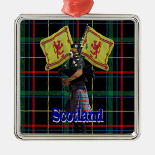 Scottish piper on tartan metal ornament