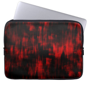 Scratched spots in bright red and black laptop sleeve