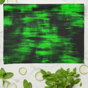Scratched stains in flashy green and strong dark tea towel