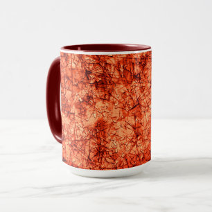Scratches on a lightly spotted coral background mug