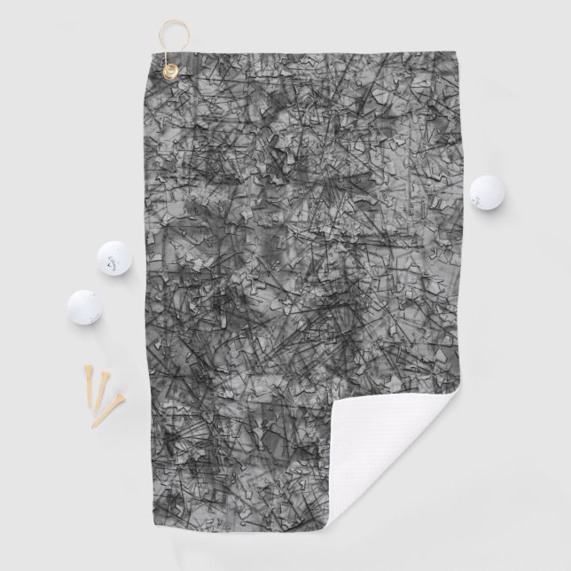 Scratches on a lightly spotted grey to black golf towel (InSitu)