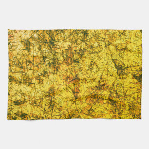 Scratches on a lightly spotted ochre yellow image tea towel