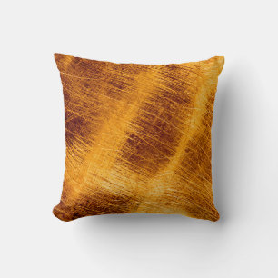 Scratches on a metallic gold background. abstract, cushion