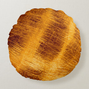 Scratches on a metallic gold background. abstract, round cushion