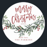 Script Merry Christmas Greenery  Classic Round Sticker<br><div class="desc">A festive,  red,  green and white merry Christmas gift sticker,  favour sticker or envelope enclosure featuring bold script and watercolor greenery with leaves and berries.</div>