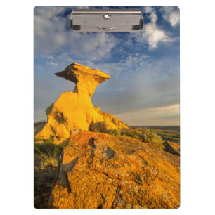 Sculpted Badlands Formation In Short Grass Clipboard