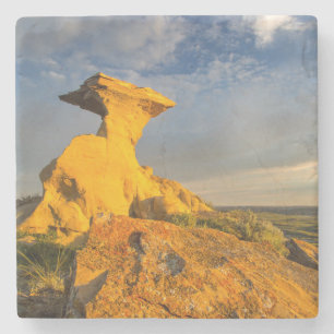 Sculpted Badlands Formation In Short Grass Stone Coaster