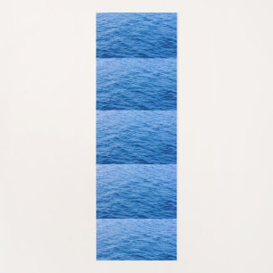 sea and mountains on yoga mat