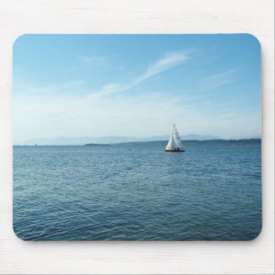 sea and sail boat under blue sky mouse pad