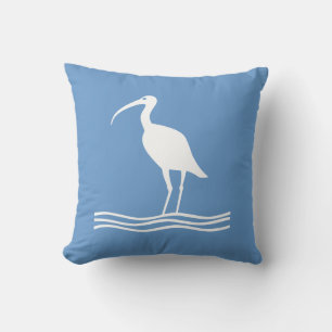 SEA BIRD. WHITE on teal blue pillow