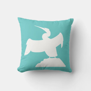 SEA BIRD. WHITE on teal blue pillow