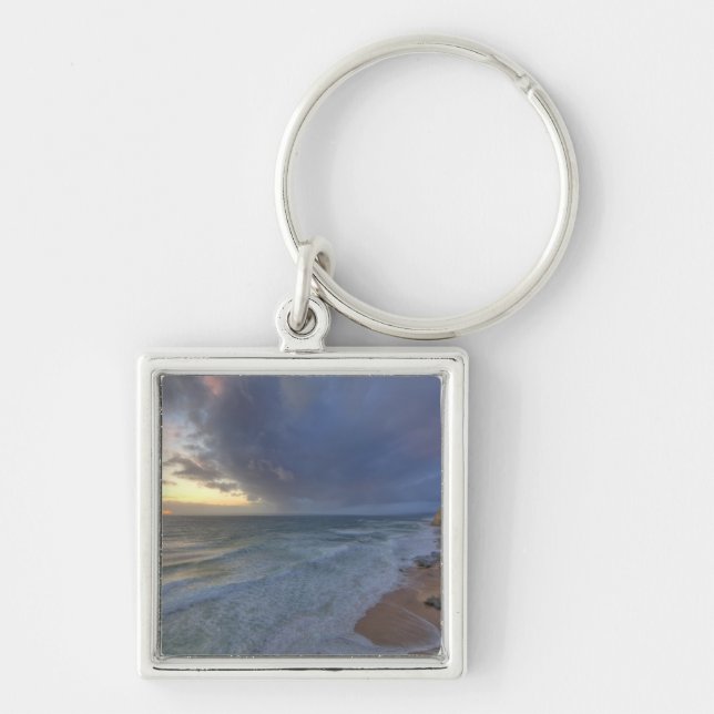 Sea cliffs catch days last light at Pomponi Key Ring (Front)