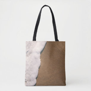 Sea foam on sand tote bag