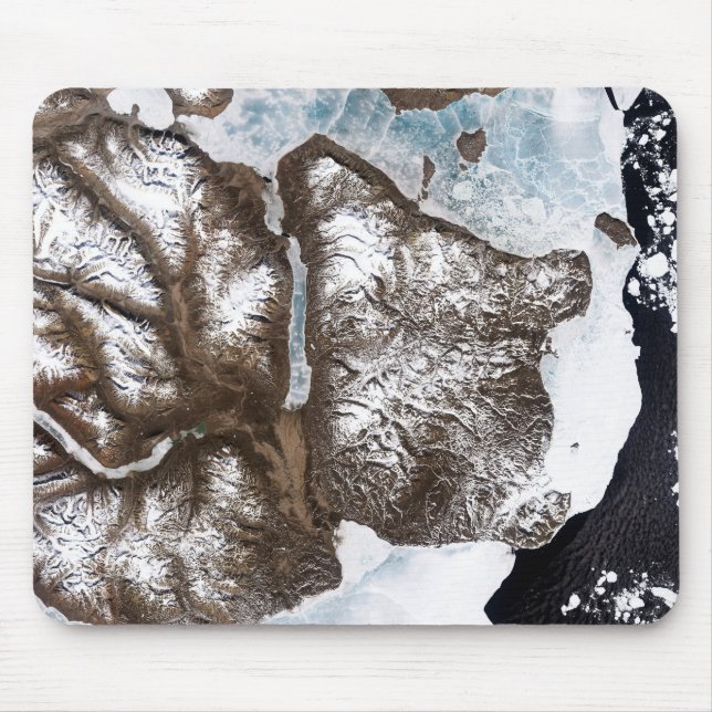 Sea ice lines the shoreline in eastern Greenlan Mouse Pad (Front)