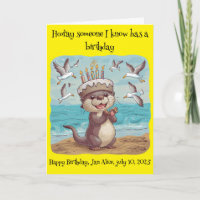 sea otter wearing cake birthday hat clapping