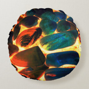 Sea oyster shell on flaming volcanic lava or fire round cushion