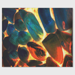 Sea oyster shell on red-hot volcanic lava or ember wrapping paper