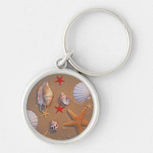 Sea Shells And Starfish Arranged On Sand Key Ring