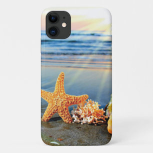Sea shells and starfish on beach iPhone 11 case