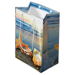 Sea shells and starfish on beach medium gift bag