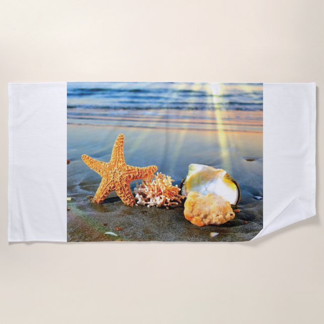 Sea shells and starfish on beach towel (Front)
