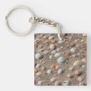 Sea  shells at the beach key ring