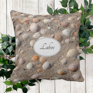Sea shells at the beach photo with monogram cushion
