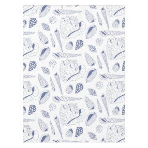 Sea shells drawing in blue and white tablecloth