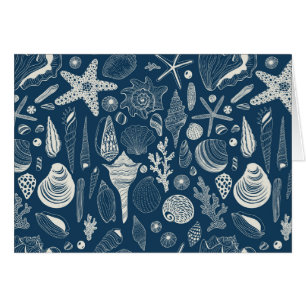 Sea shells on dark blue