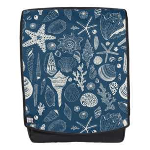 Sea shells on dark blue backpack