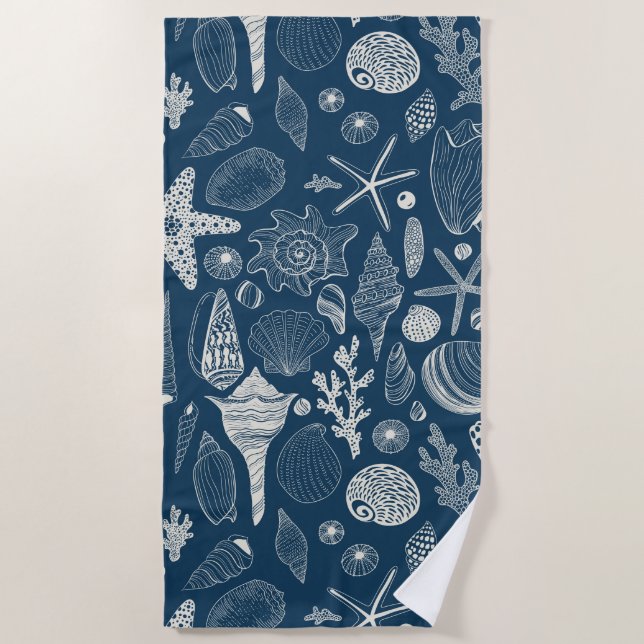 Sea shells on  dark blue beach towel (Front)