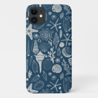 Sea shells on dark blue