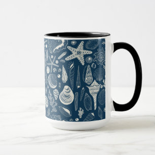 Sea shells on dark blue mug