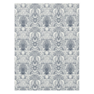 Sea shells on  dark blue tablecloth